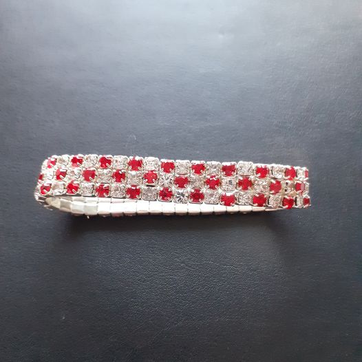 Silver colour and red expanding costume bracelet 